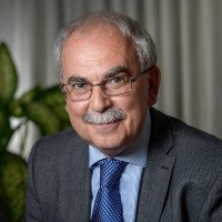 Portrait of Dr Bassam Hallis OBE, Summit Chair